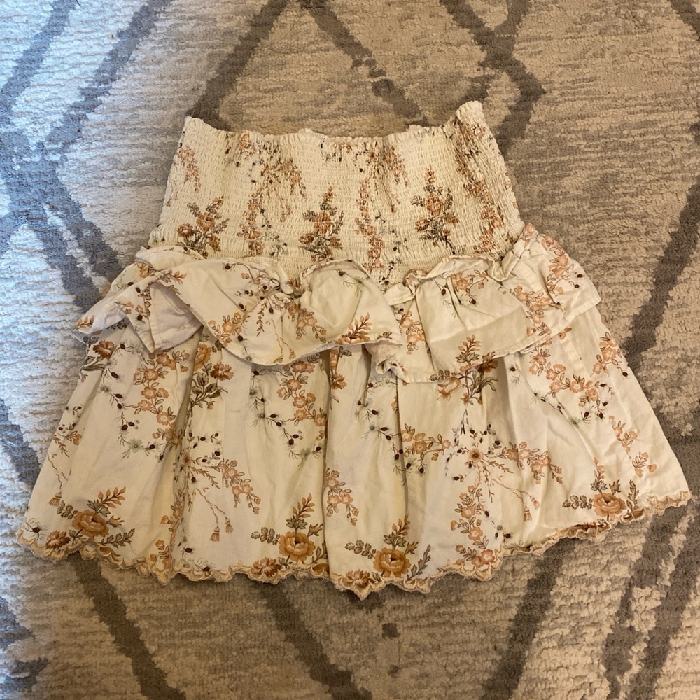 LoveShackFancy Cream Mini Skirt with Ruffled Smocked Design
